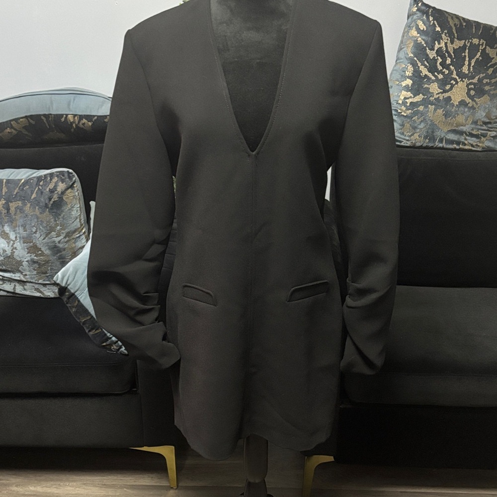 Elegant Black Women's Mini Dress with shoulder pads.